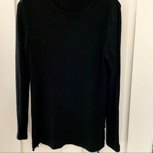 Black tunic with fancy ties. narrow with stretch. 17” chest 18 1/2” under arm